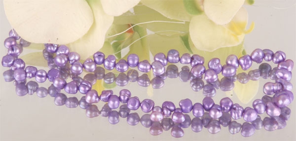 S101 Perlenstrang  Süsswasser Perlen-Strang offen  Perlen irregular ca 5-8mm  - violett -